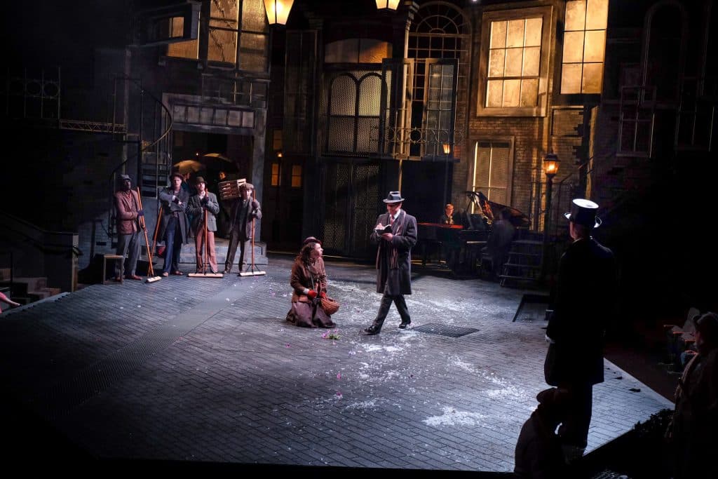 Cast of PlayMakers Repertory Company's "My Fair Lady." in the opening scene at Covent Garden. Directed by Tyne Rafaeli. Set by McKay Coble, Lighting by Masha Tsimring, Costumes by Andrea Hood. Photo by Huth Photo. Cast of PlayMakers Repertory Company's "My Fair Lady." Directed by Tyne Rafaeli. Set by McKay Coble, Lighting by Masha Tsimring, Costumes by Andrea Hood. Photo by Huth Photo.